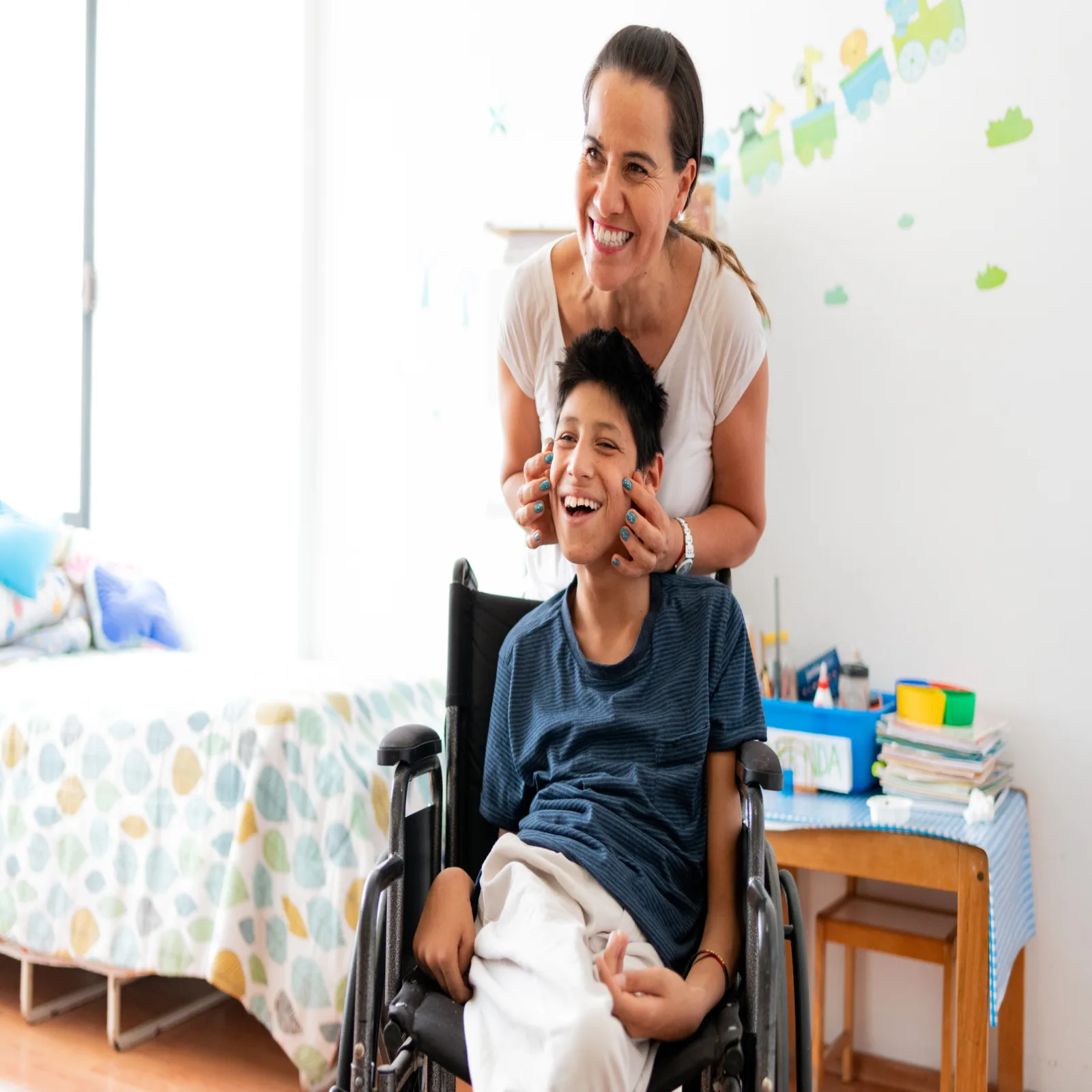Therapist doing facial massage to a child with Cerebral Palsy